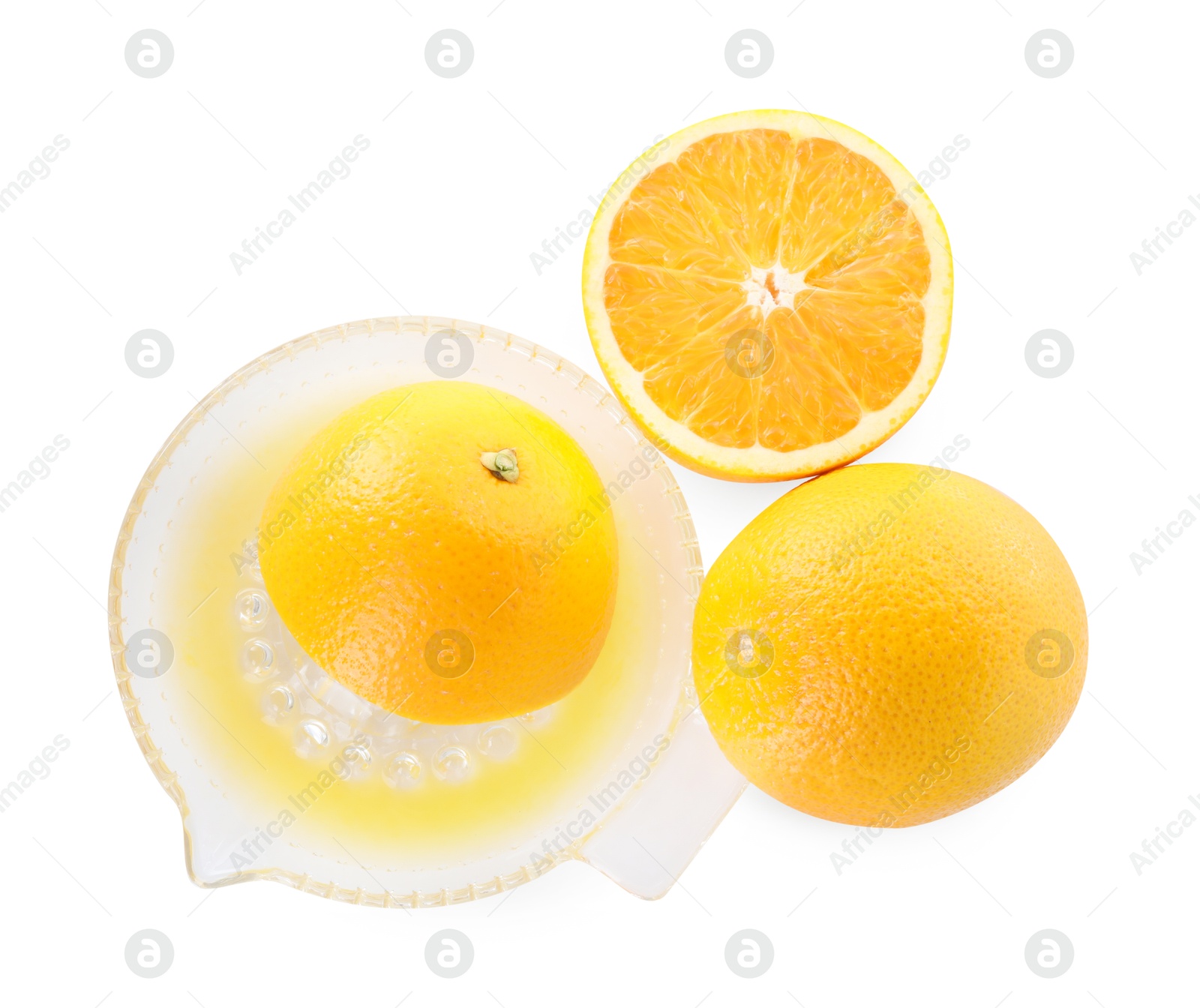 Photo of Glass juicer and oranges isolated on white, top view