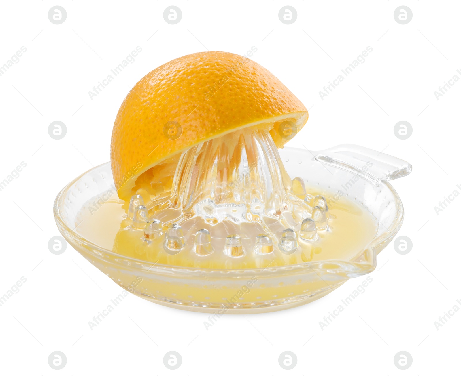 Photo of Glass juicer and squeezed orange isolated on white