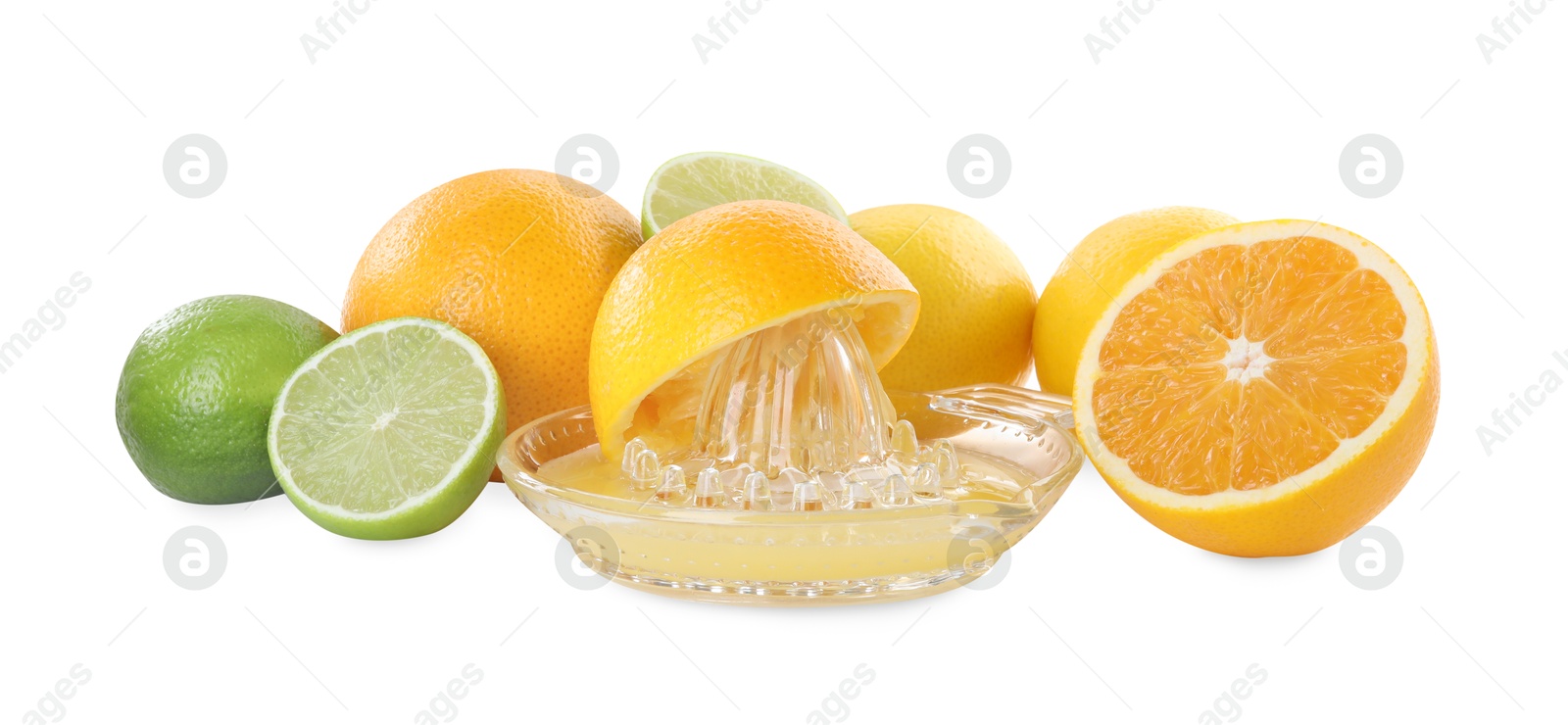 Photo of Glass juicer and different citrus fruits isolated on white