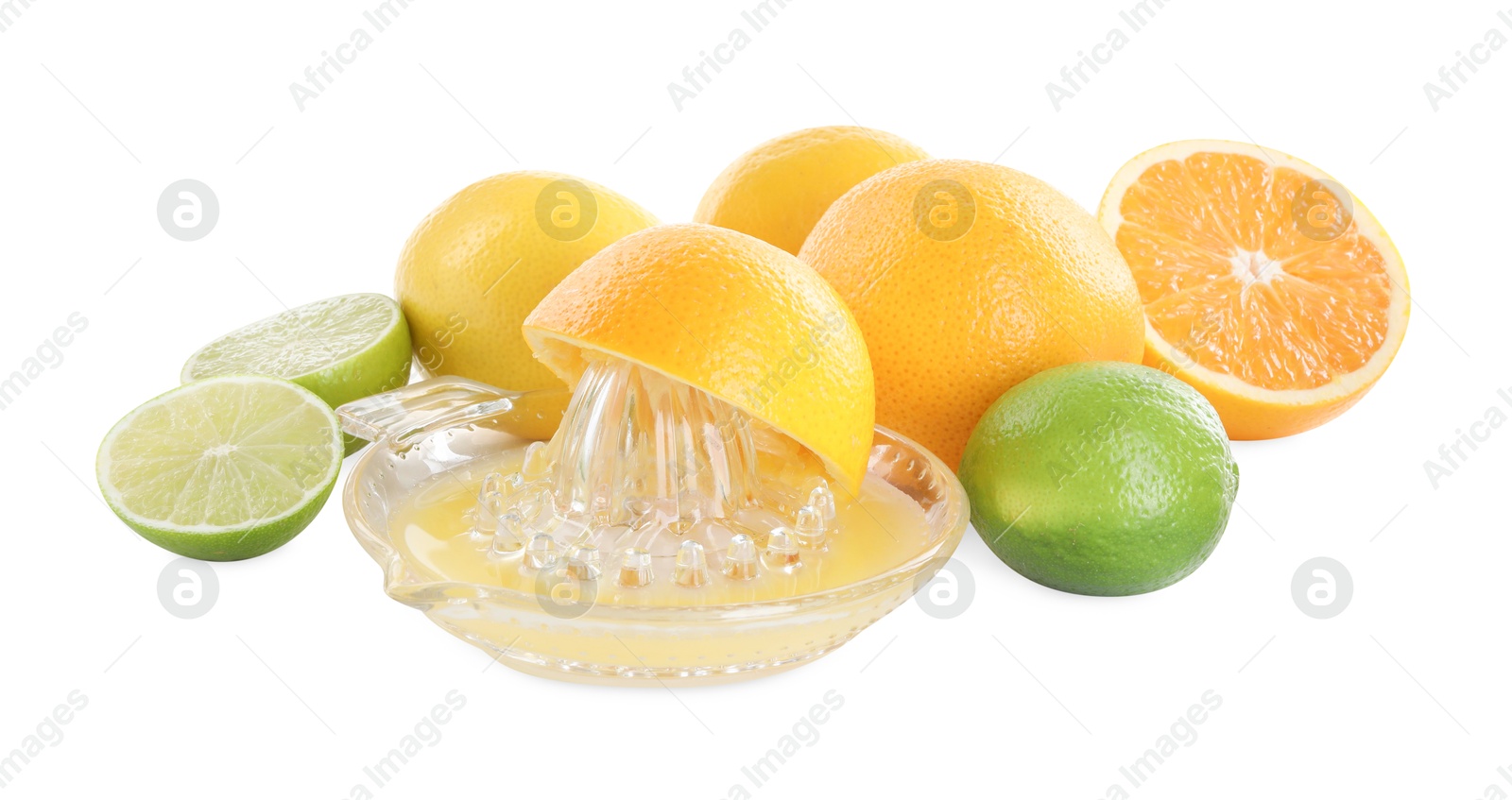 Photo of Glass juicer and different citrus fruits isolated on white