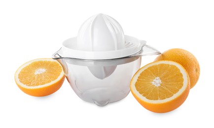 Photo of Plastic juicer and oranges isolated on white