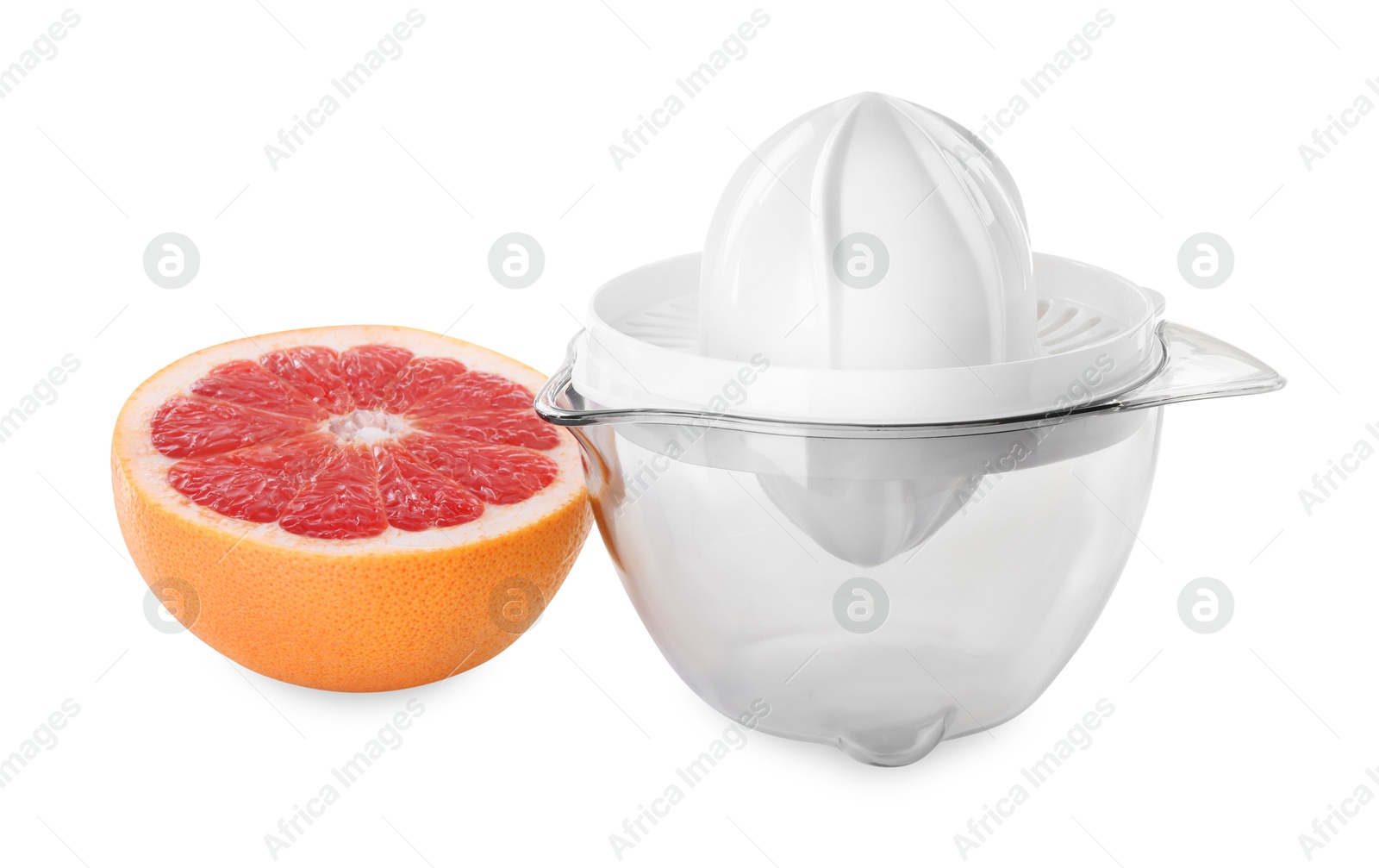 Photo of Plastic juicer and half of grapefruit isolated on white