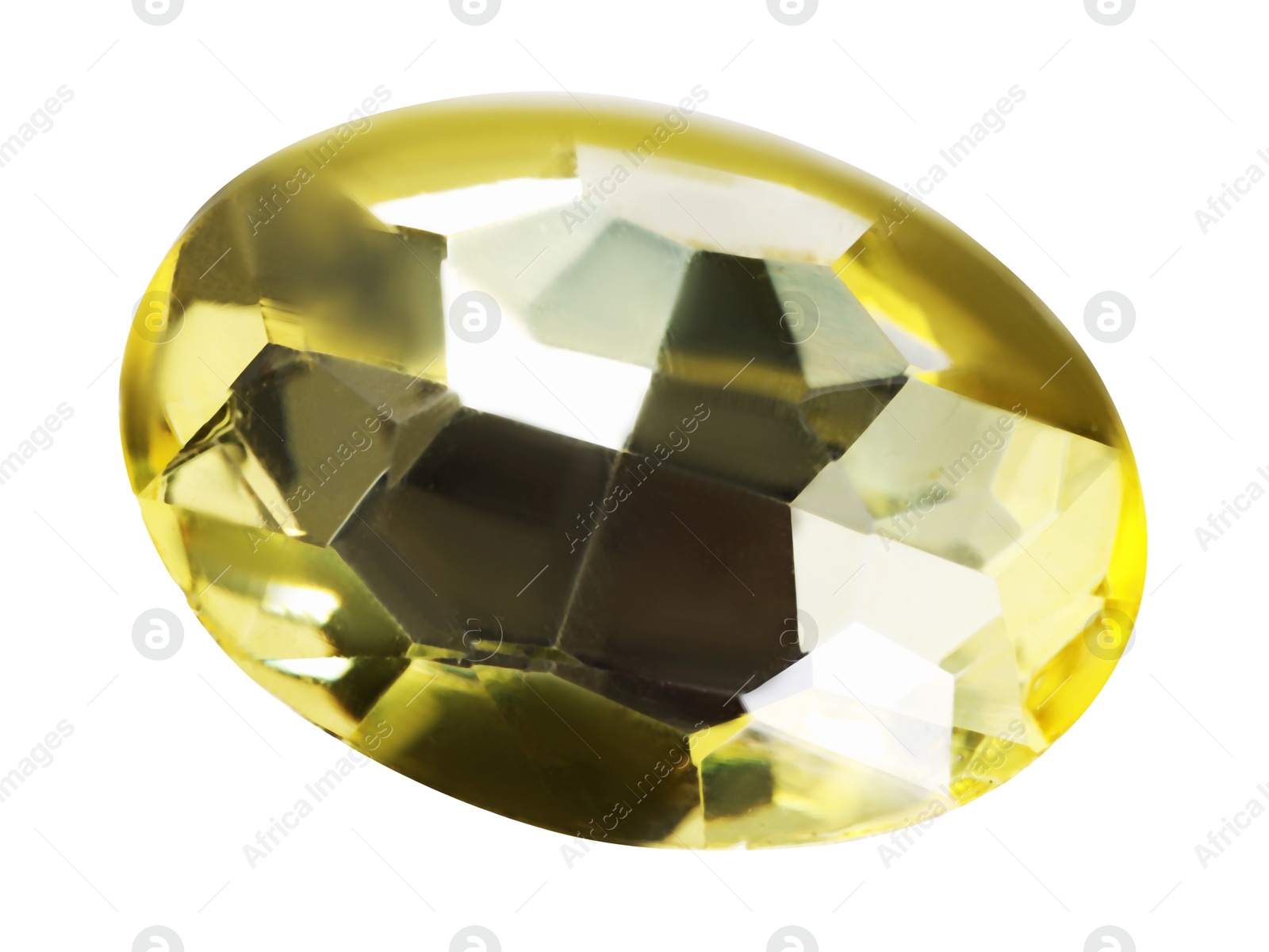 Photo of One yellow shiny gemstone isolated on white