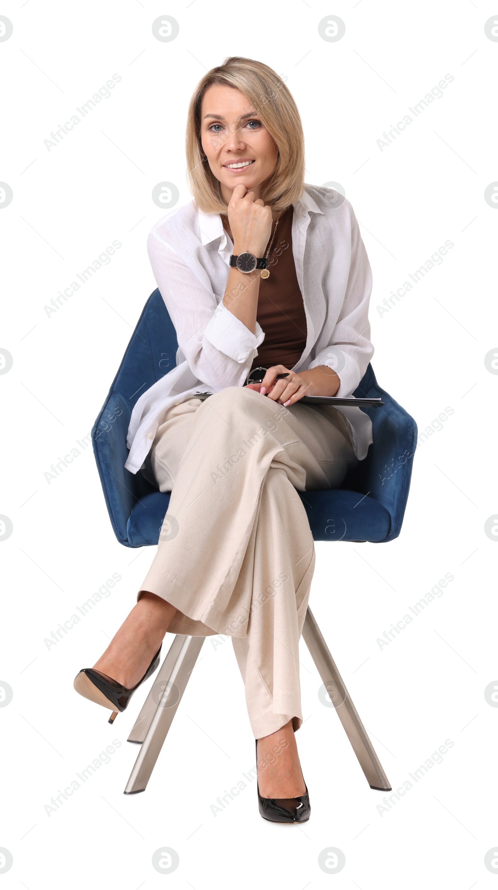 Photo of Professional psychologist with clipboard sitting on chair against white background