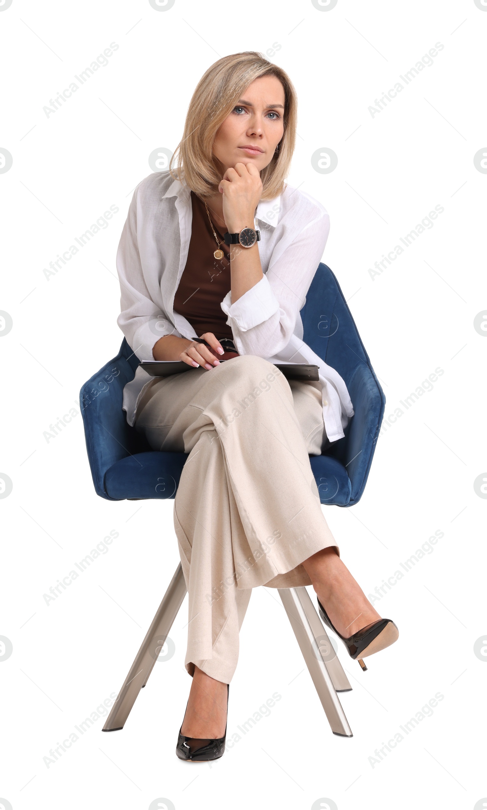 Photo of Professional psychologist with clipboard sitting on chair against white background