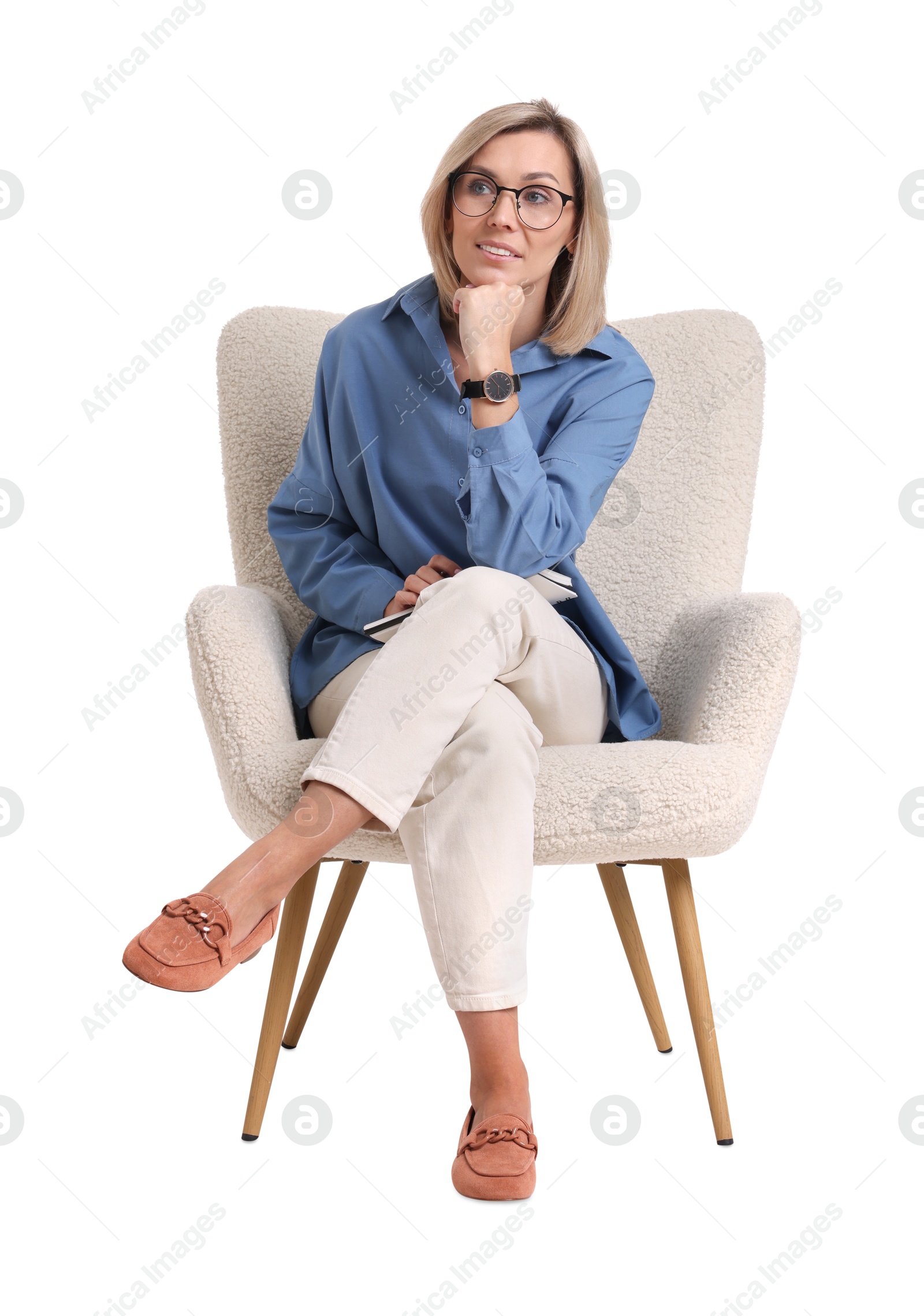 Photo of Professional psychologist with notebook sitting on chair against white background