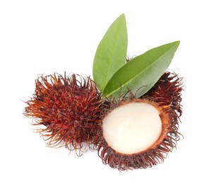 Photo of Delicious ripe rambutans and green leaves isolated on white. Exotic fruit