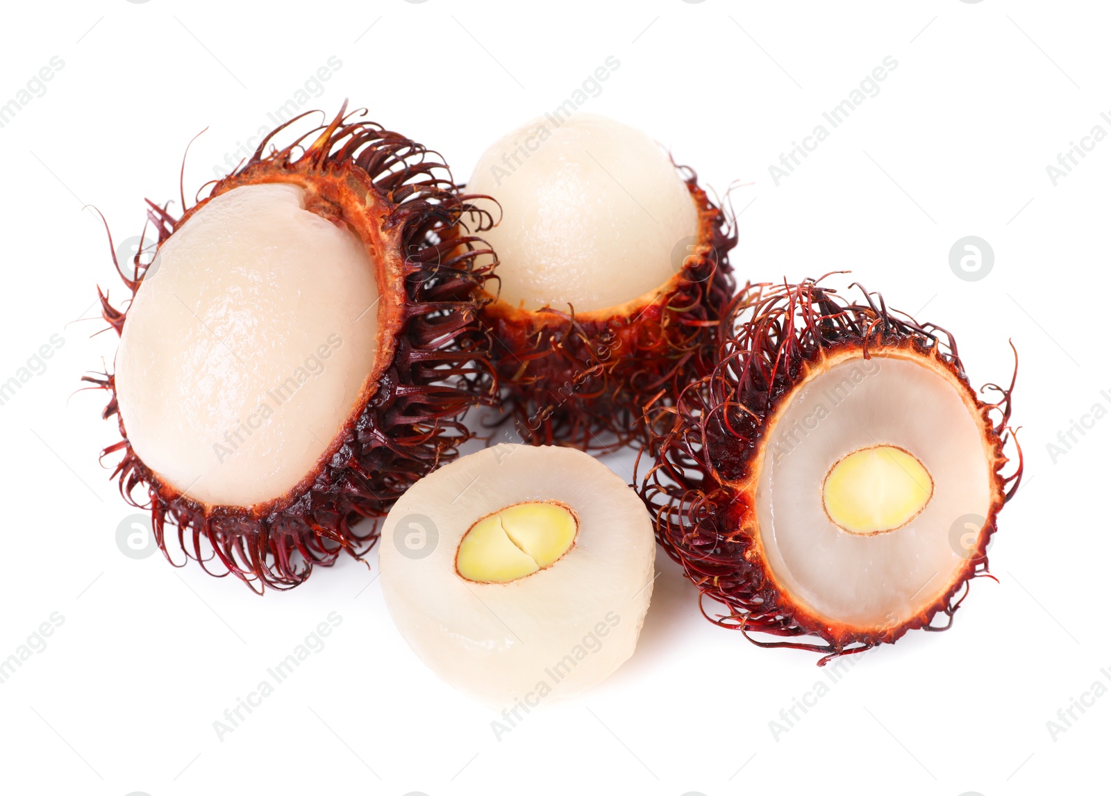 Photo of Delicious ripe rambutans isolated on white. Exotic fruit