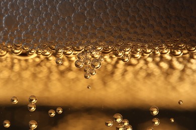 Photo of Glass of beer as background, macro view