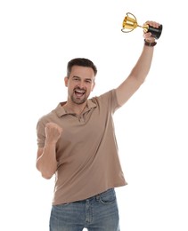 Photo of Happy winner with golden trophy cup on white background