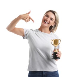 Photo of Happy winner with golden trophy cup on white background