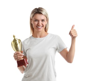 Happy winner with golden trophy cup showing thumbs up on white background