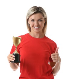 Photo of Happy winner with golden trophy cup showing thumbs up on white background