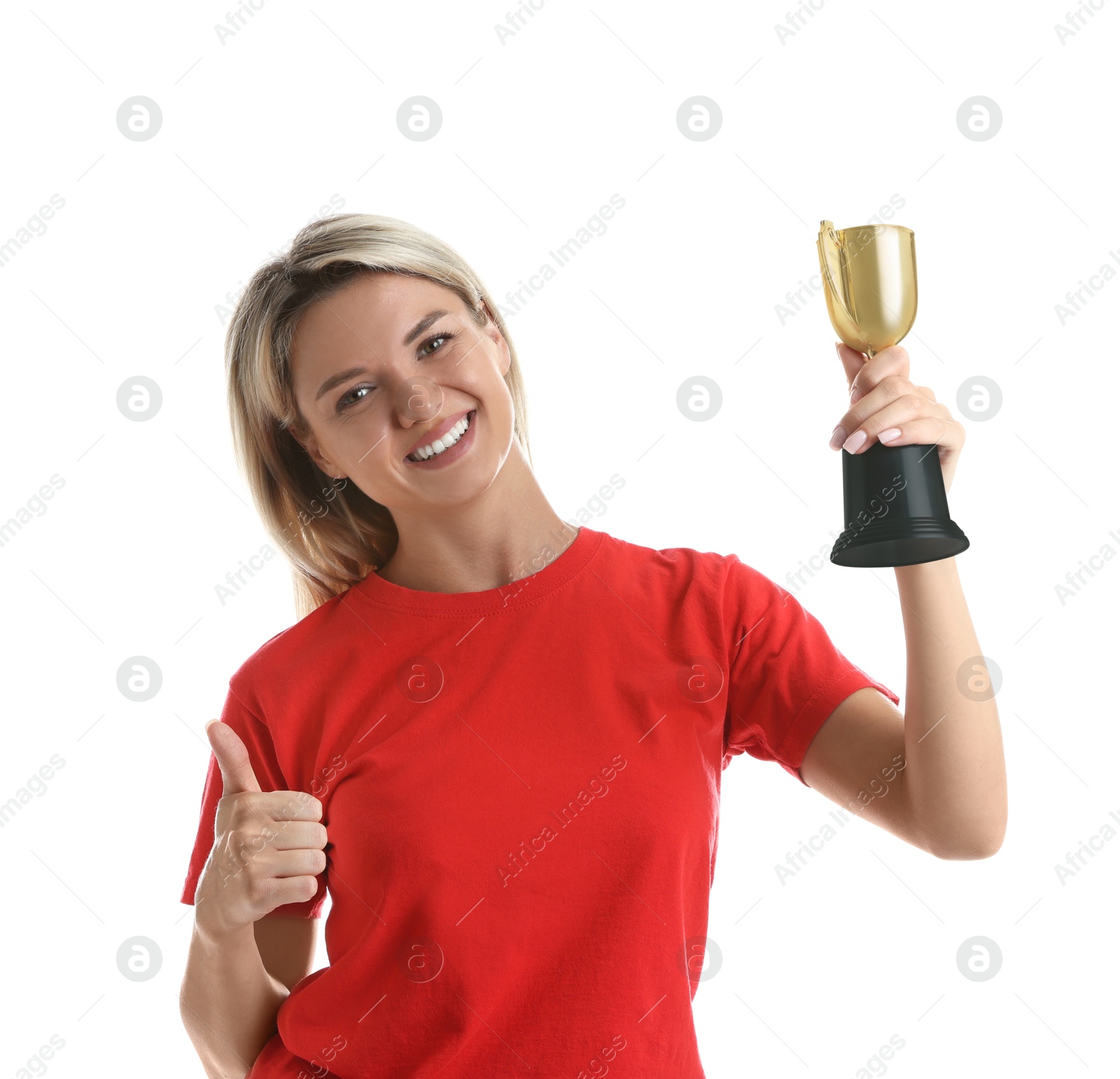 Photo of Happy winner with golden trophy cup showing thumbs up on white background