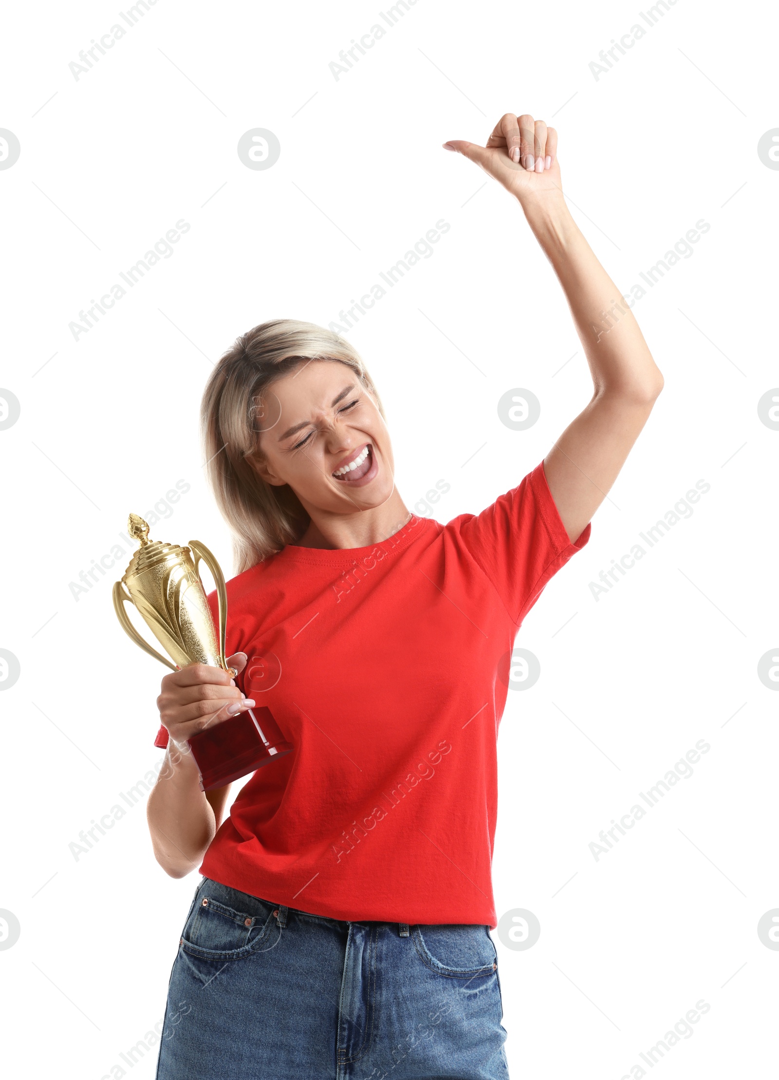 Photo of Happy winner with golden trophy cup showing thumbs up on white background