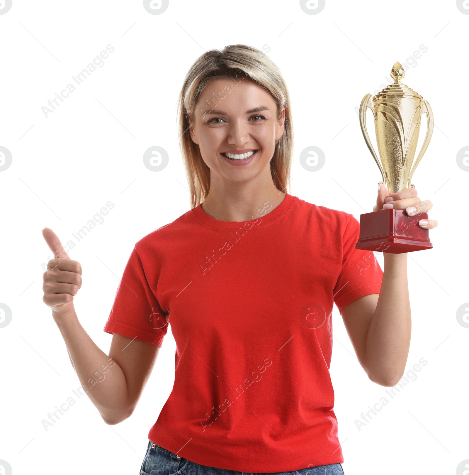 Photo of Happy winner with golden trophy cup showing thumbs up on white background