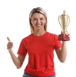 Photo of Happy winner with golden trophy cup showing thumbs up on white background