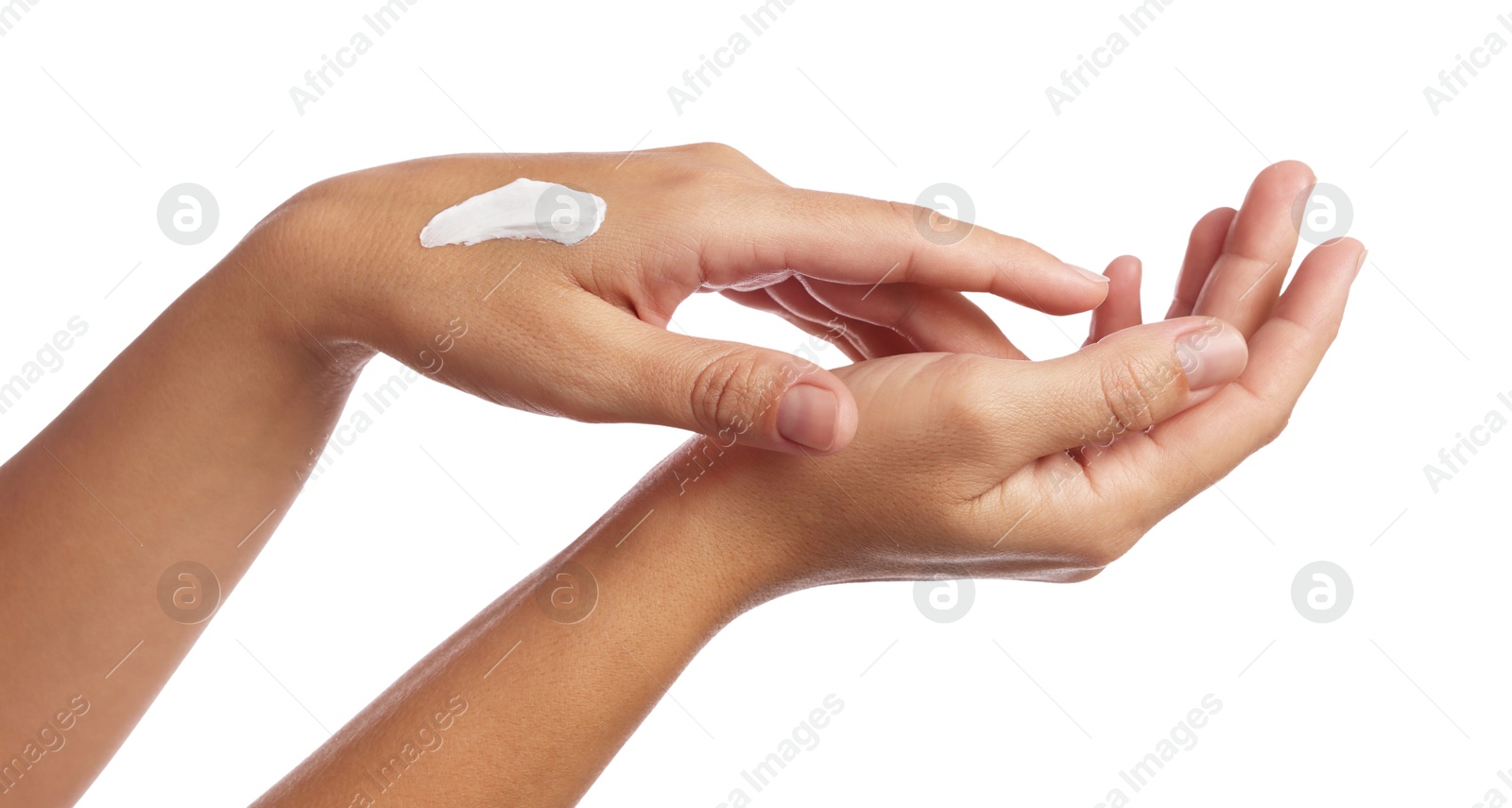 Photo of Woman applying cream onto hand on white background, closeup