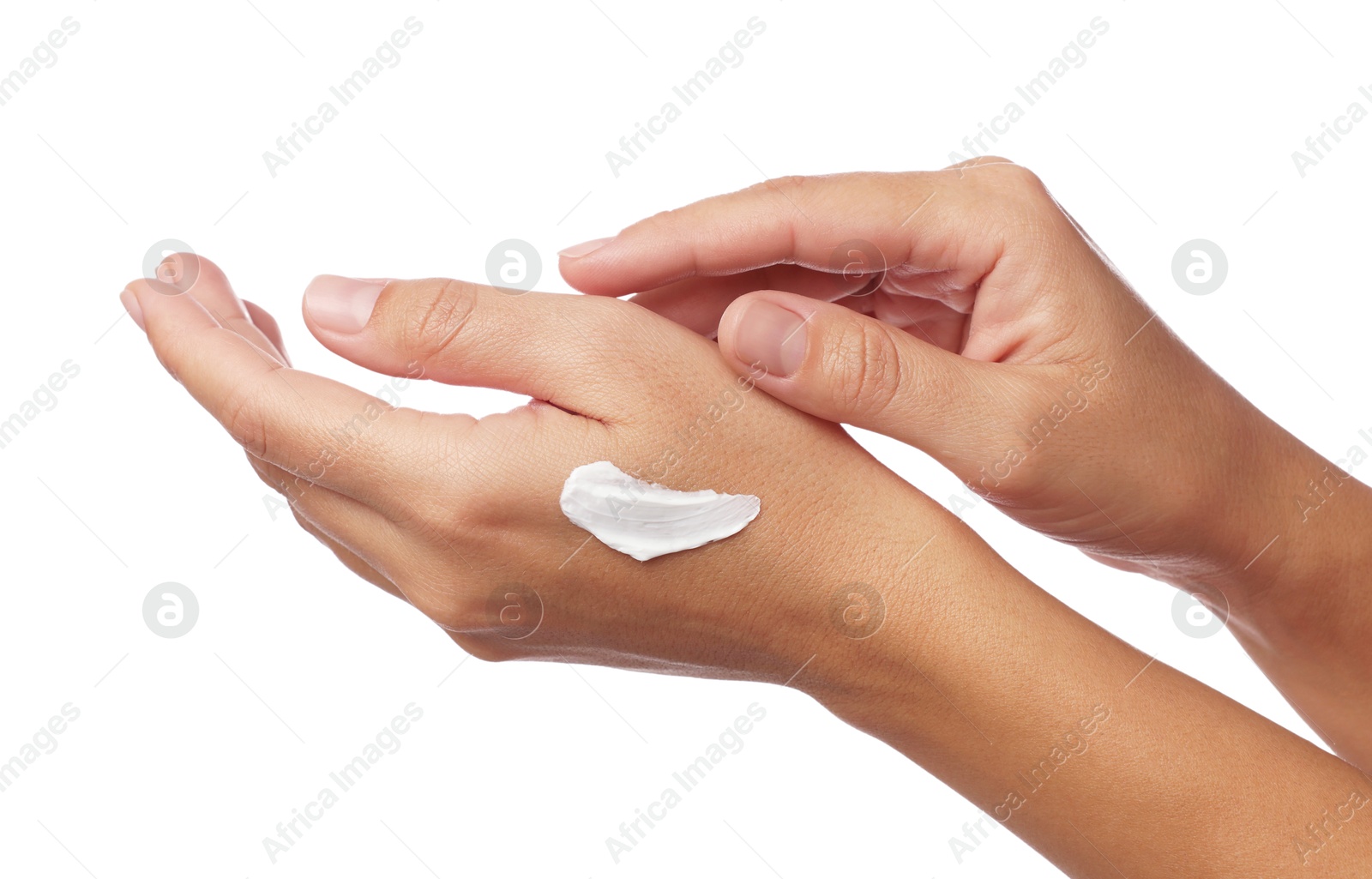 Photo of Woman applying cream onto hand on white background, closeup