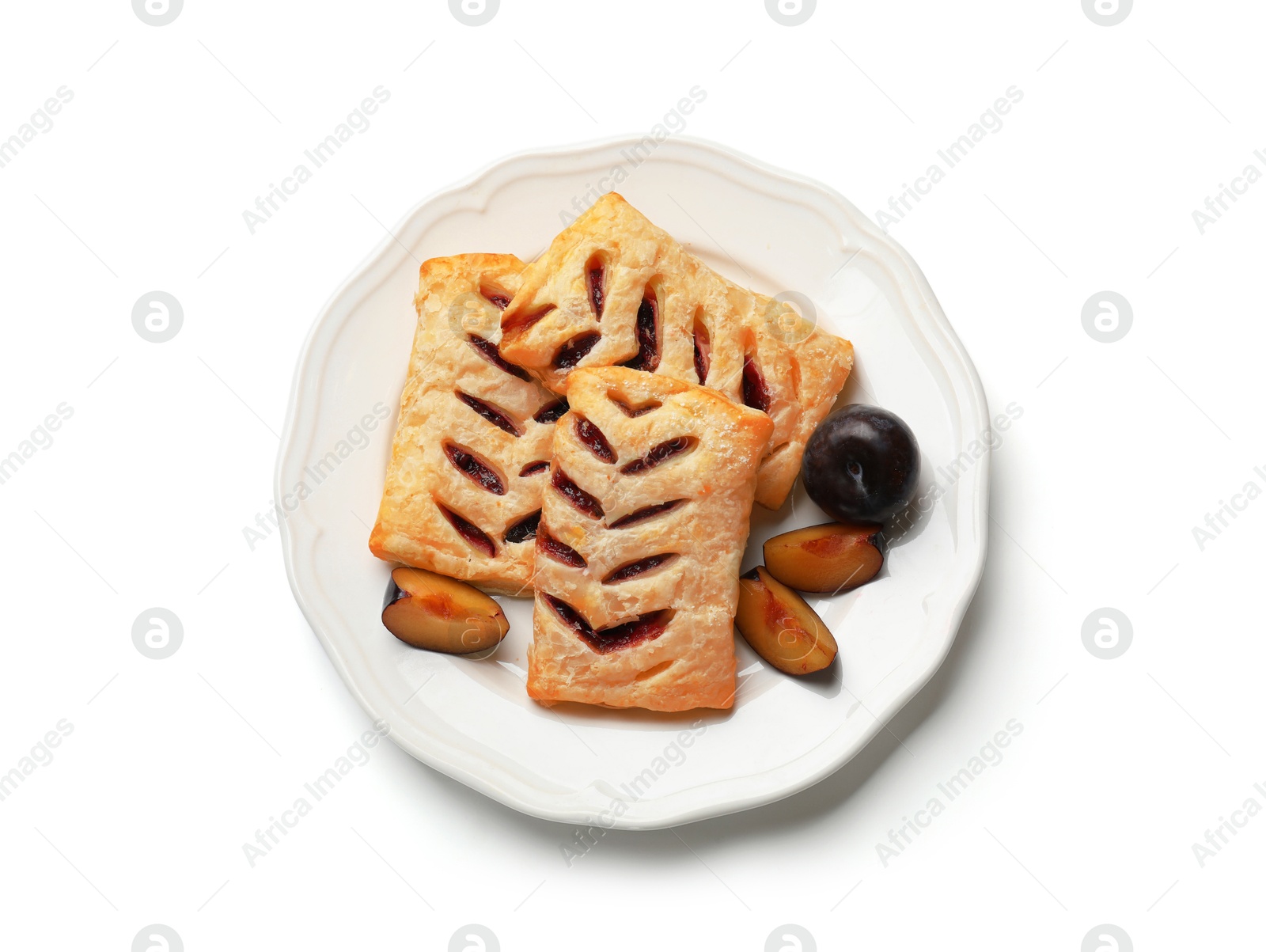 Photo of Delicious puff pastries and plums isolated on white, top view