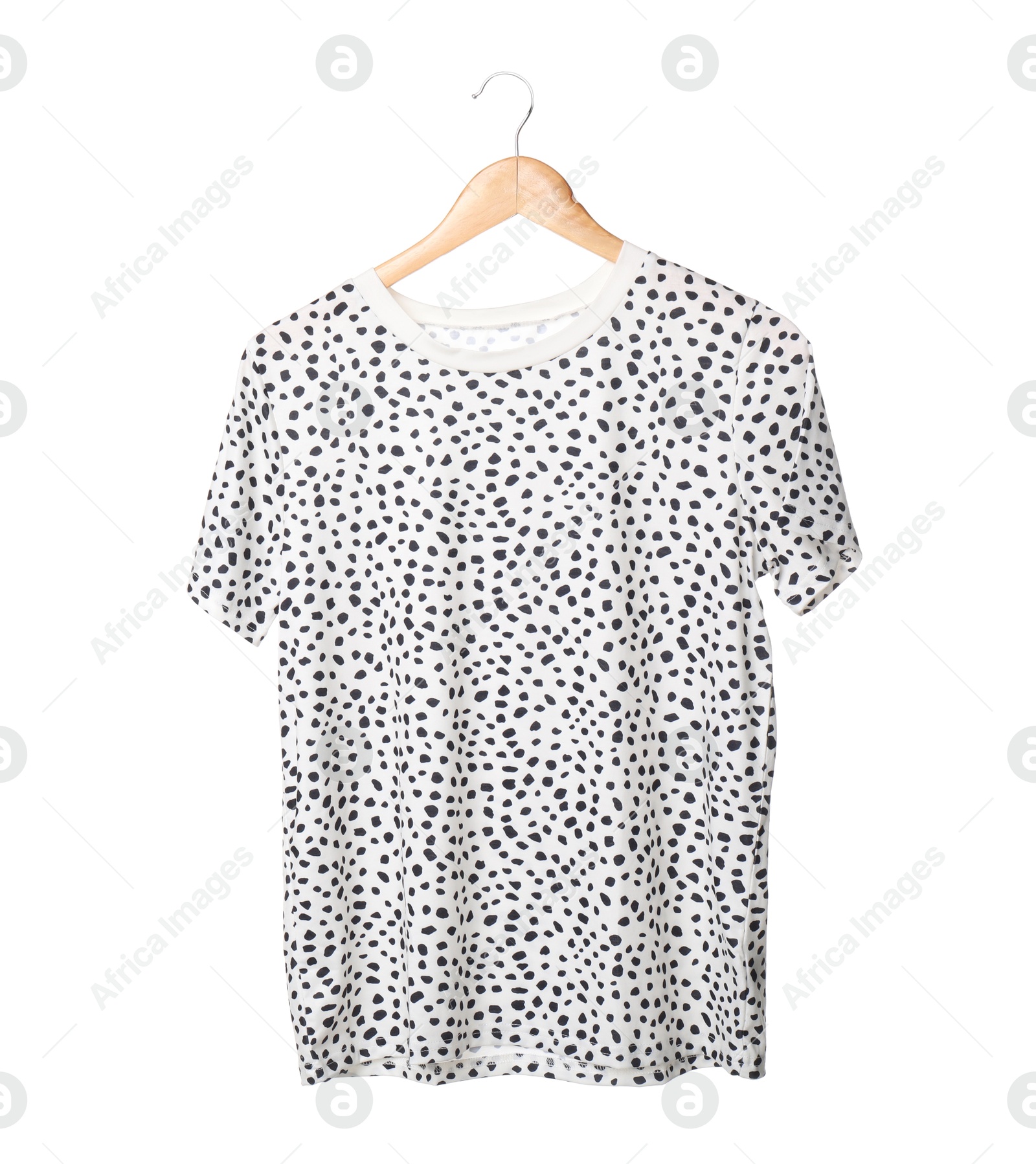 Photo of Woman holding hanger with beautiful t-shirt on white background, closeup