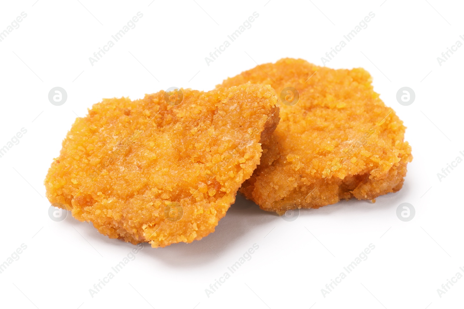 Photo of Delicious fresh chicken nuggets isolated on white