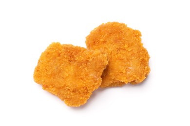 Photo of Delicious chicken nuggets isolated on white, top view