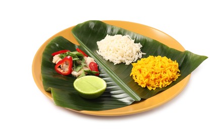 Photo of Cut banana leaf with different food isolated on white. Healthy eco serving