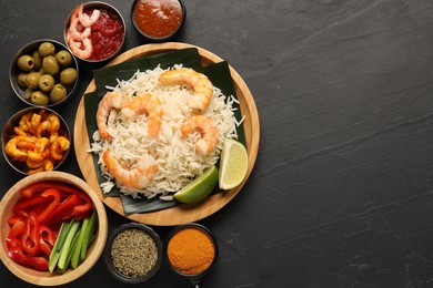 Photo of Pieces of banana leaf with rice and shrimps among other food, spices and sauce on grey textured table, flat lay. Space for text