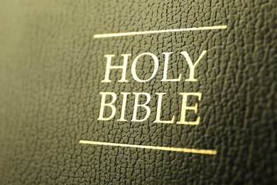 Hardcover Holy Bible as background, closeup view