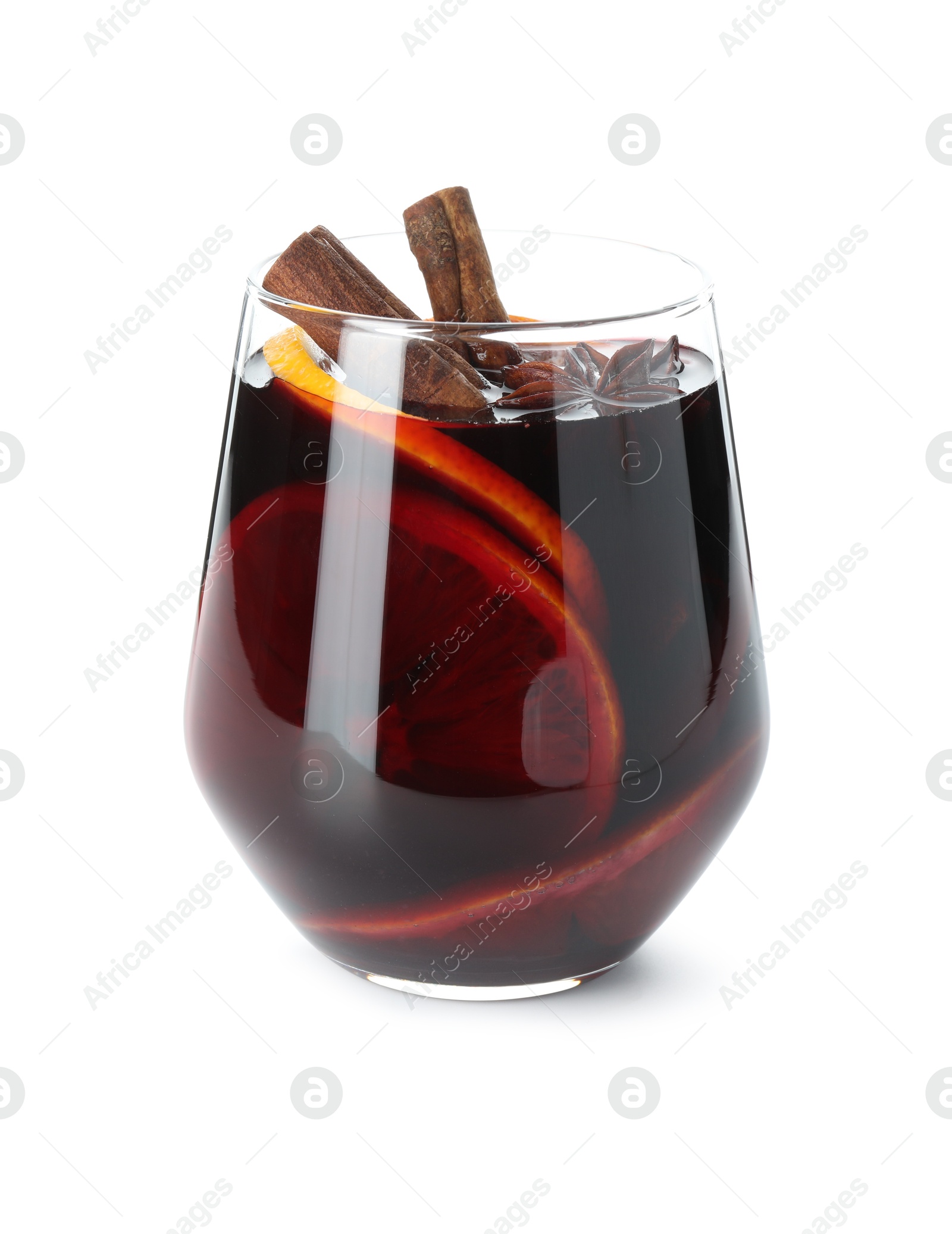 Photo of Tasty mulled wine with orange and spices isolated on white