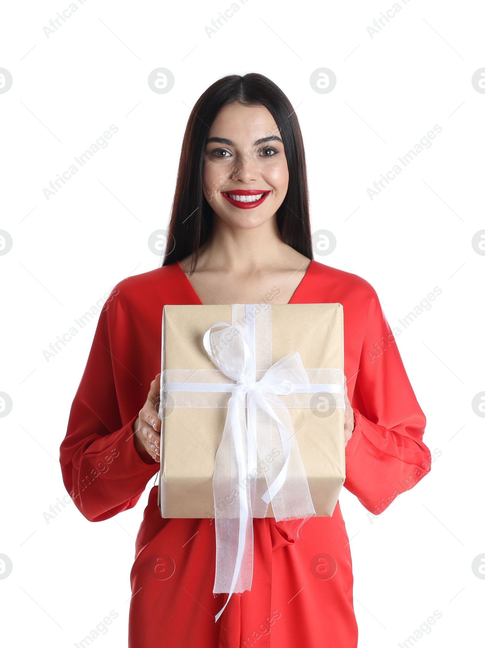 Photo of Woman in red dress holding Christmas gift on white background