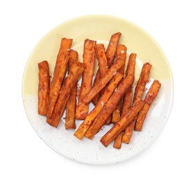 Photo of Delicious sweet potato fries isolated on white, top view