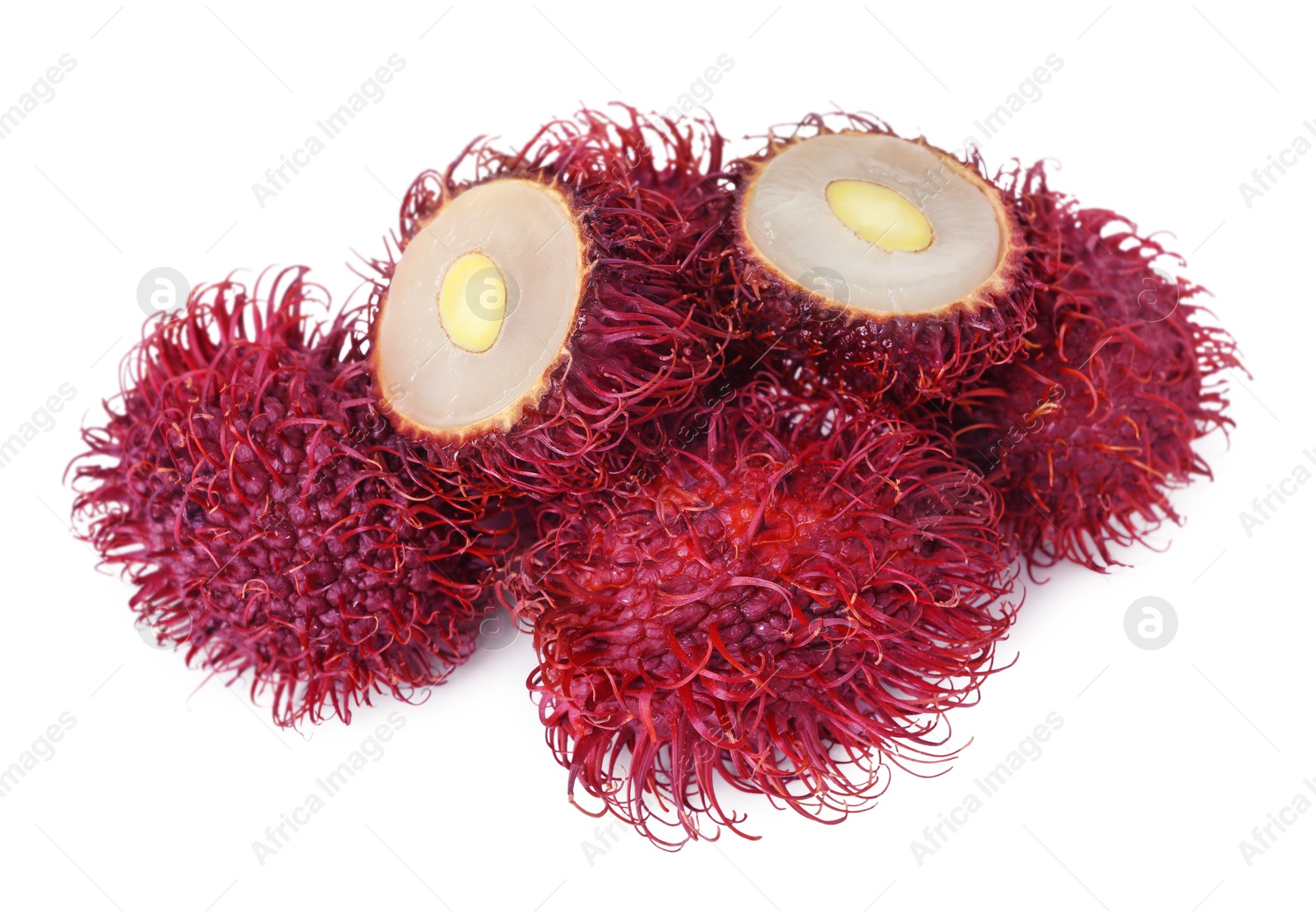 Photo of Delicious ripe rambutans isolated on white. Exotic fruit