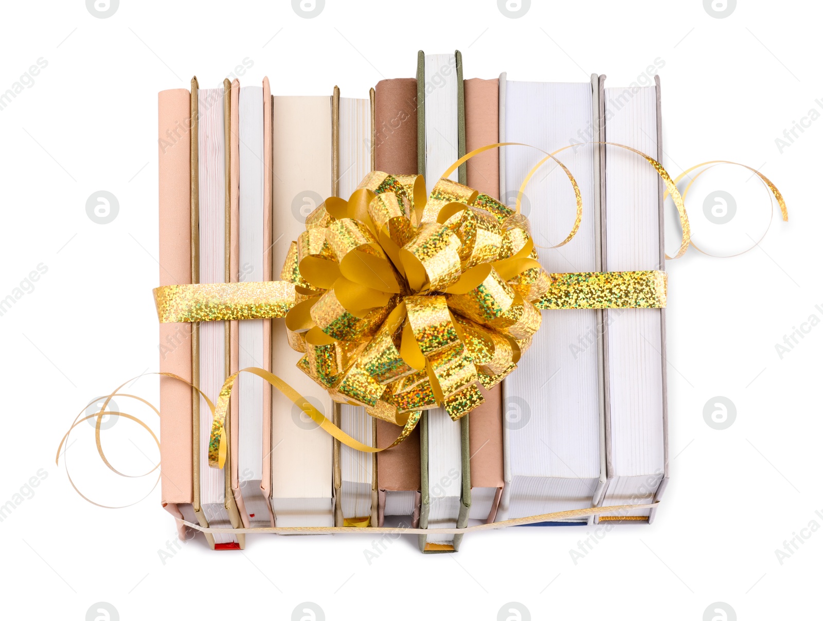 Photo of Books with golden bow as gift isolated on white