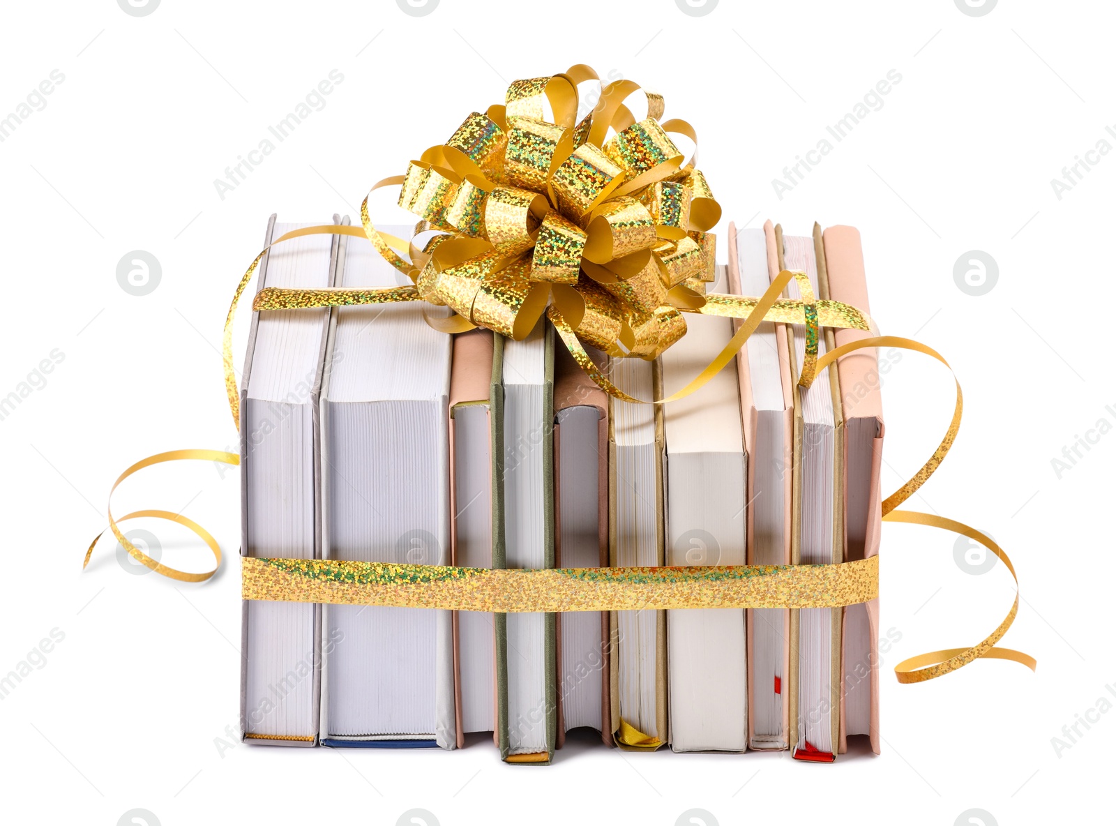 Photo of Books with golden bow as gift isolated on white