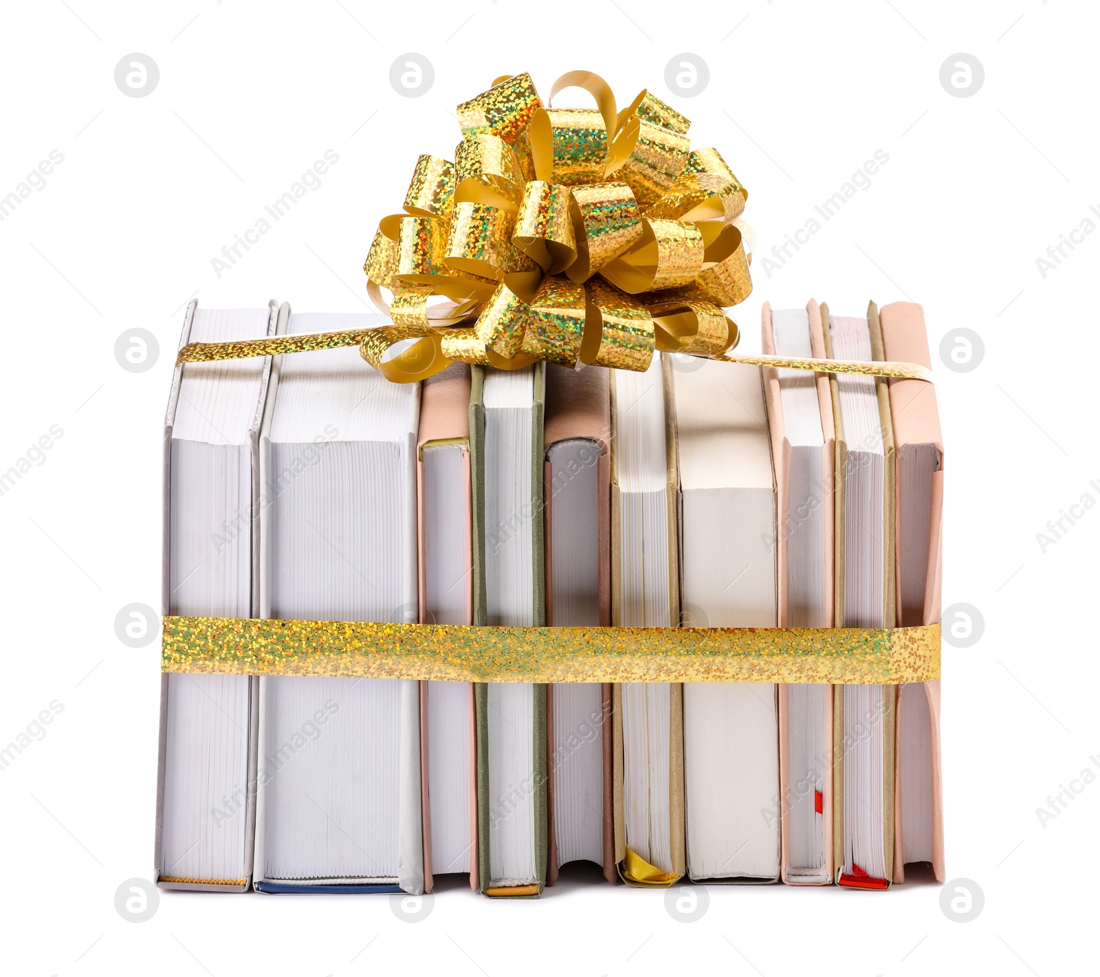 Photo of Books with golden bow as gift isolated on white