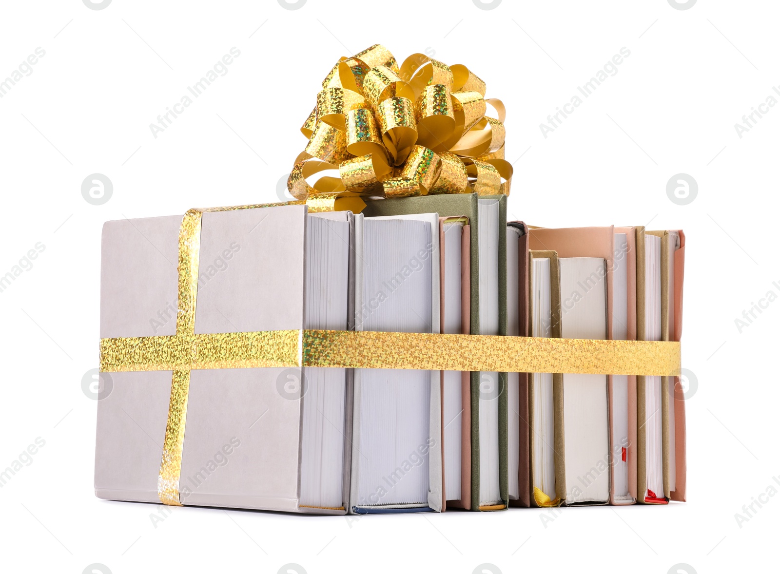 Photo of Books with golden bow as gift isolated on white