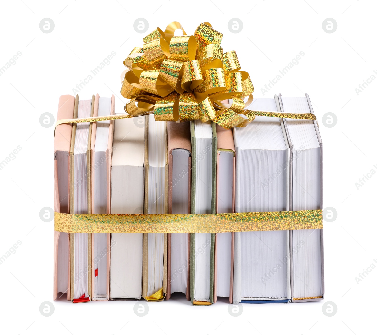 Photo of Books with golden bow as gift isolated on white