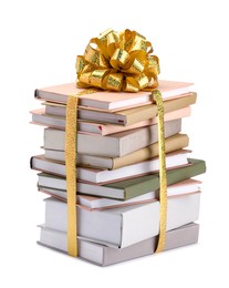 Photo of Stack of books with golden bow as gift isolated on white