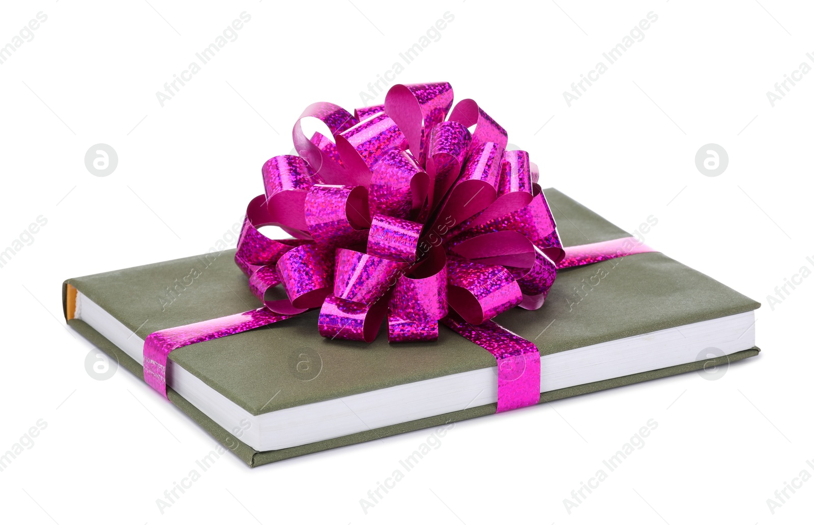 Photo of One book with purple bow as gift isolated on white