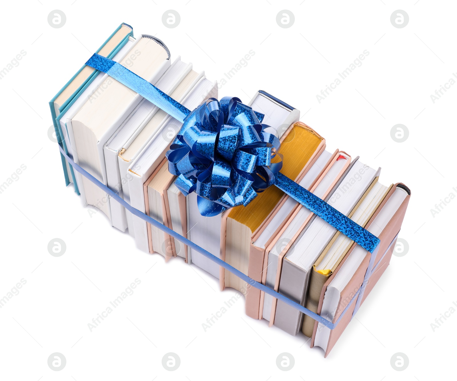 Photo of Books with blue bow as gift isolated on white