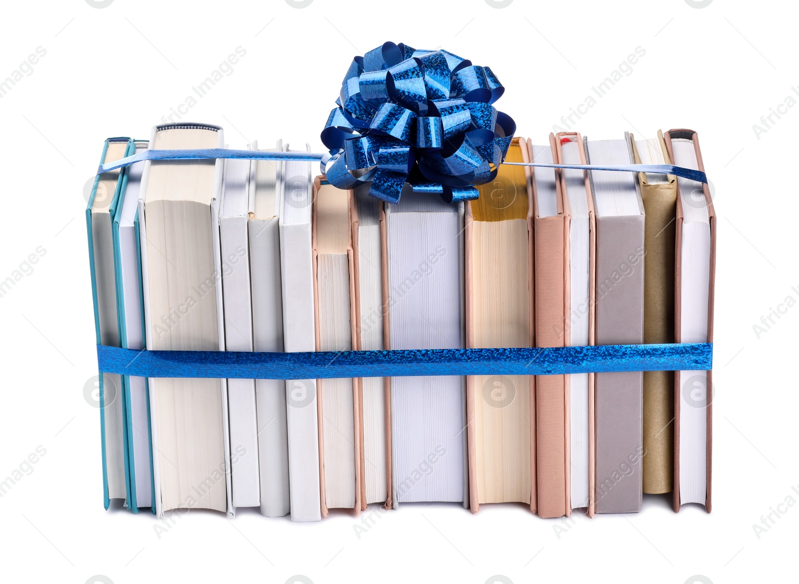 Photo of Books with blue bow as gift isolated on white