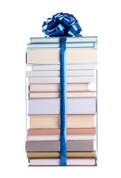 Photo of Stack of books with blue bow as gift isolated on white