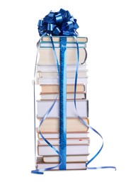 Photo of Stack of books with blue bow as gift isolated on white