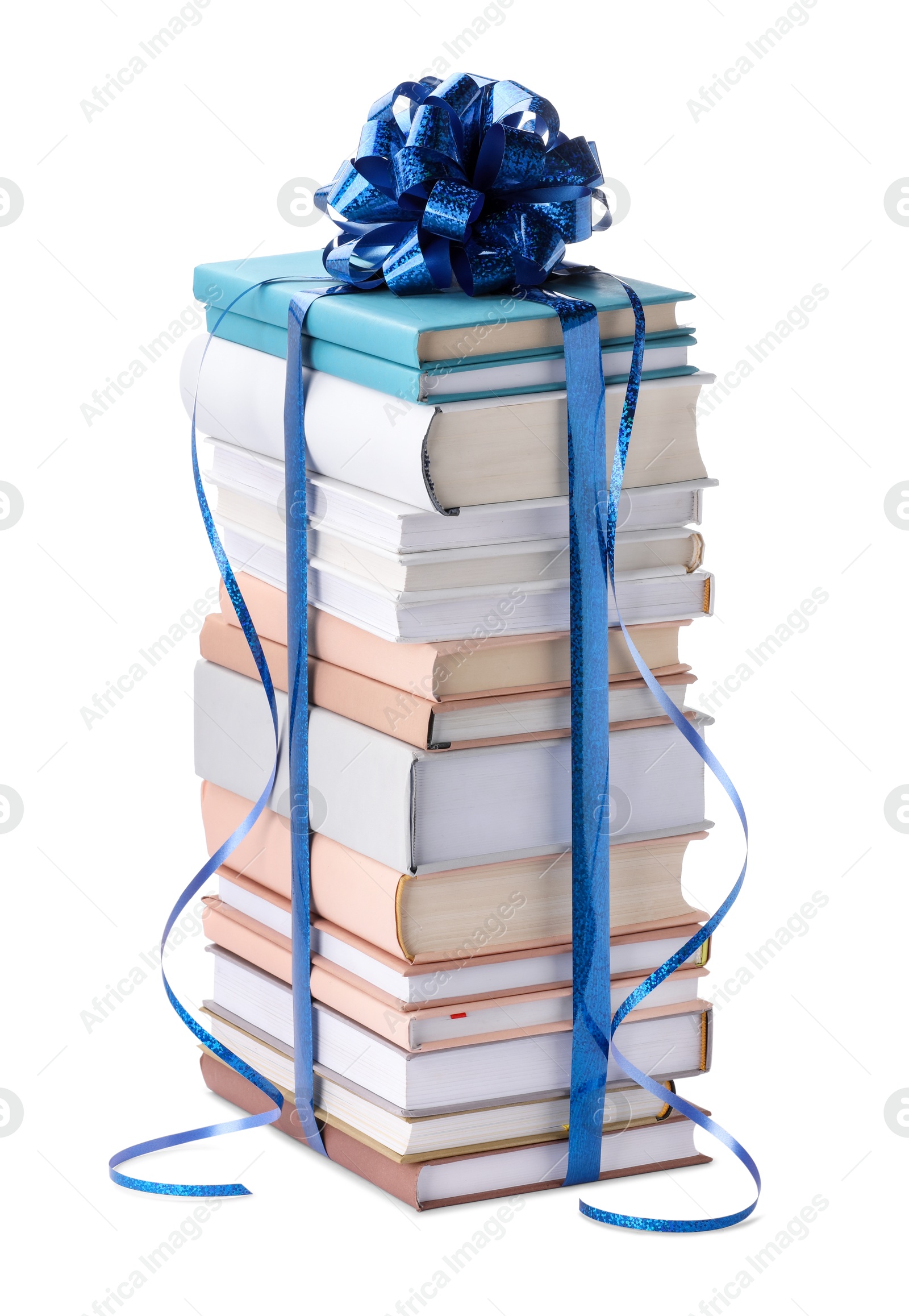 Photo of Stack of books with blue bow as gift isolated on white