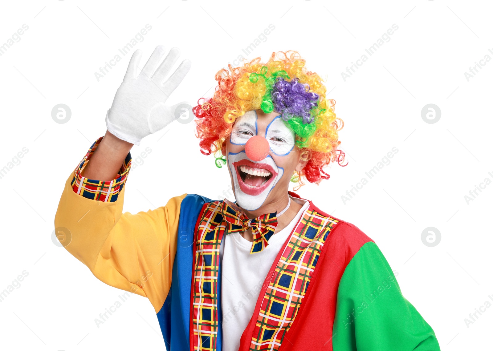 Photo of Portrait of happy clown waving on white background