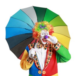 Photo of Happy clown with colorful umbrella beeping his nose on white background