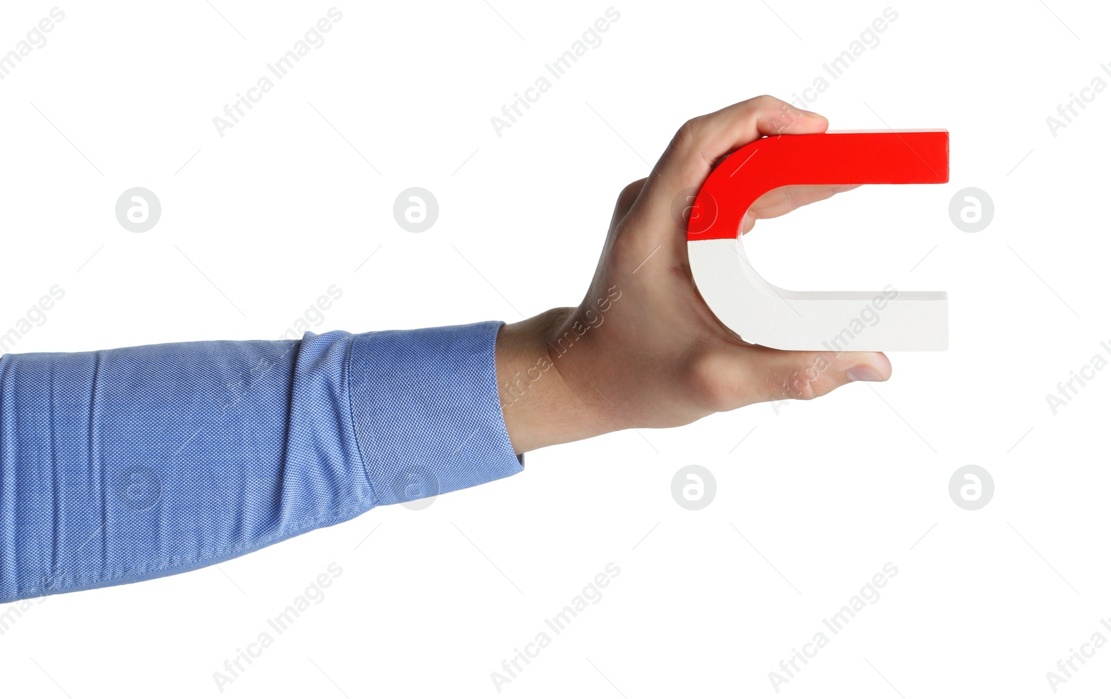 Photo of Man with horseshoe magnet on white background, closeup