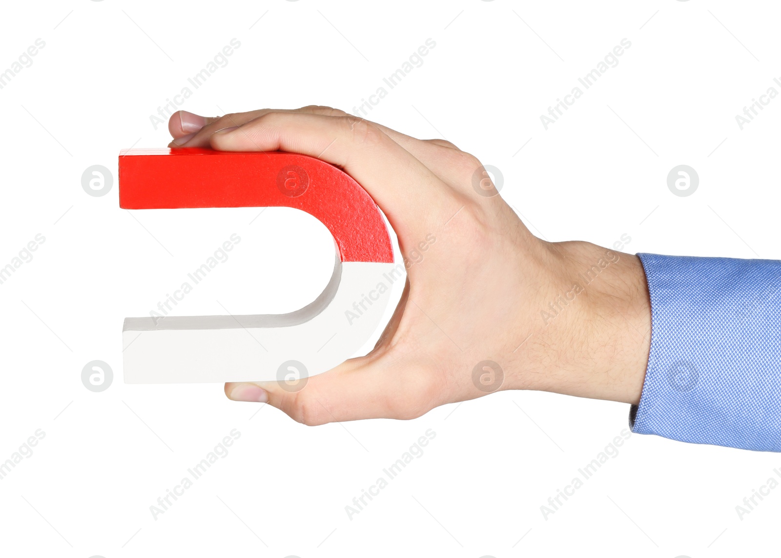 Photo of Man with horseshoe magnet on white background, closeup